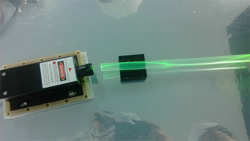 Laser transmission in the waveguide